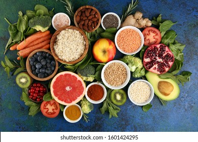 Healthy Food Clean Eating Selection: Fruit, Vegetable, Seeds, Superfood, Cereals, Leaf Vegetable On Background