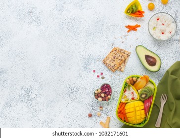 Healthy Food Concept: Close Up Of Open Lunch Box With Rice, Fresh Fruits And Vegetables On The Grey Background With Blank Space For Text; Top View, Flat Lay