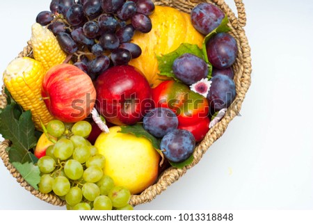 Healthy food Concept Composition with Vegetables and Fruits in Rustic Basket
