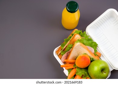 Healthy Food Concept. Lunch Box At School And Office On A Dark Background. Social Distance, Stay Safe. View From Above. Copy Space .