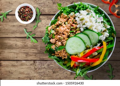 Healthy Food Concept. Paleo Keto Taco Bowl With Ground Turkey, Cauliflower Rice, Paprikas, Cucumber, Kale And Pumpkin Seeds. Top View, Flat Lay, Space For Text.