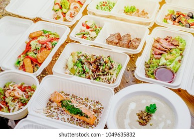 Healthy Food Delivery. Take Away For Diet. Fitness Nutrition, Vegetables, Meat And Fruits In White Eco Boxes. Top View, Flat Lay At Natural Wood With Copy Space