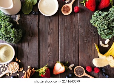 Healthy Food Frame. Smoothie Making Concept. Top Down View On A Dark Wood Background. Copy Space. Fruit, Yogurt, Almond Milk And Various Ingredients.