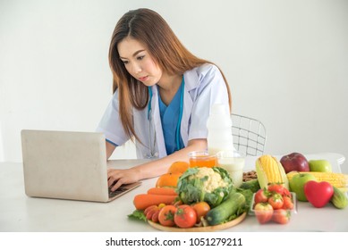 Healthy Food And Health Coach Concept, Nutritionist Consultation Online And Touch Computer