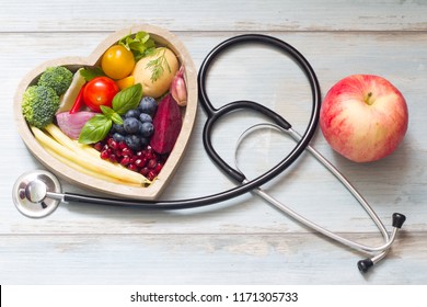 Healthy food in heart diet concept with stethoscope
