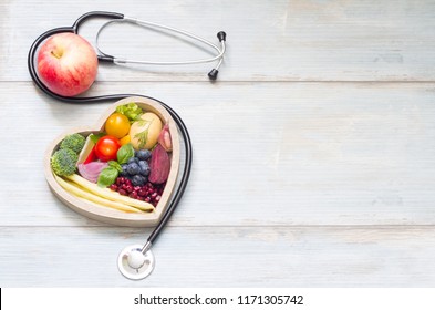 Healthy food in heart diet concept with stethoscope