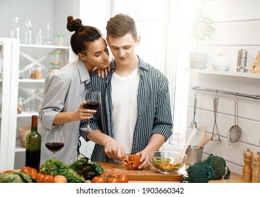 Healthy Food At Home. Happy Loving Couple Is Preparing The Proper Meal In The Kitchen.