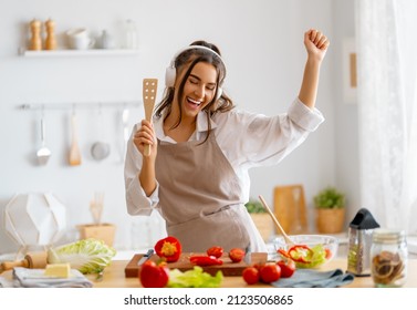 Healthy Food At Home. Woman Is Preparing The Proper Meal In The Kitchen.