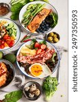 Healthy food, keto diet, diet lunch concept. Assortment of various healthy keto mealsю Top view on white background.