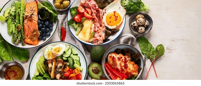 Healthy food, keto diet, diet lunch concept. Assortment of various healthy keto mealsю Top view on white background. Panorama with copy space. - Powered by Shutterstock