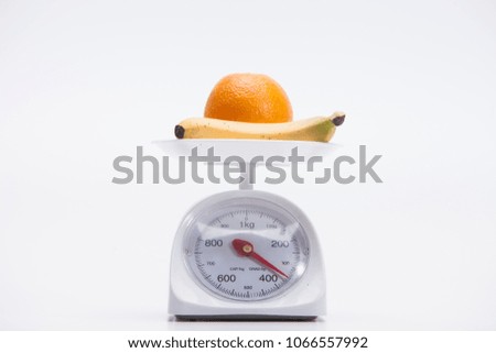 Healthy food on balance scale