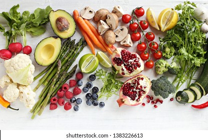 Healthy food. Selection of vegetables, fruits and berries for ketogenic diet, clean eating, plant based, vegetarian and super food concept.