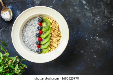 Healthy Food Smoothie Bowl, Oatmeal, Chia Seeds And Berries (breakfast Dish Or Healthy Snack) Menu Keto Or Paleo
Concept. Background. Top View. Copy Space For Text