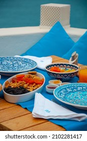 Healthy Food Table Setting For Two. Blue View. Healthy And Colorful Mediterranean Diet Breakfast