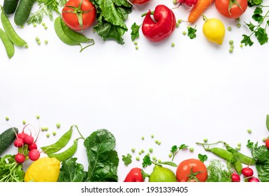 Healthy food vegetarian food background. Frame of fresh vegetables and fruits on white background top view