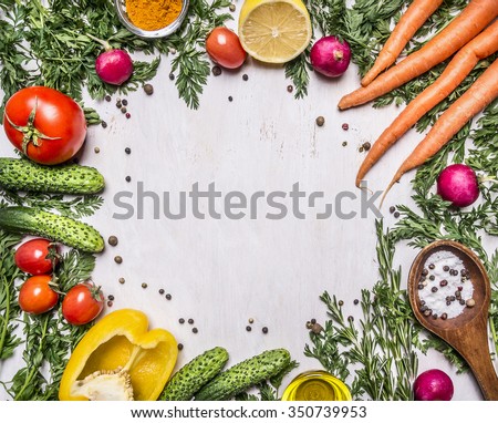 Healthy foods, cooking and vegetarian concept fresh carrots with cherry tomatoes, garlic, lemon radish, peppers, cucumbers, butter on wooden rustic background top view