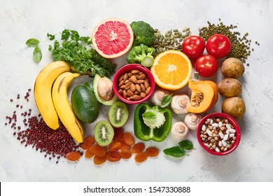 Healthy foods high in potassium. Products containing  vitamins, antioxidants and micronutrients for healthy balanced diet. Top view, flat lay 