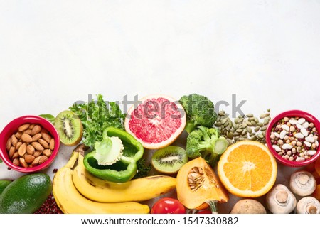 Healthy foods high in potassium. Products containing  vitamins, antioxidants and micronutrients for healthy balanced diet. Top view, flat lay with copy space
