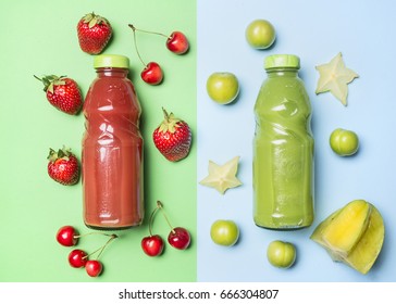 Healthy foods Red and green smoothies in glass bottles, next to the laid out ingredients, green plums, strawberries, carambola and cherry, on a green and blue background, top view