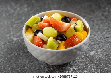 Healthy fresh fruit salad in bowl. - Powered by Shutterstock