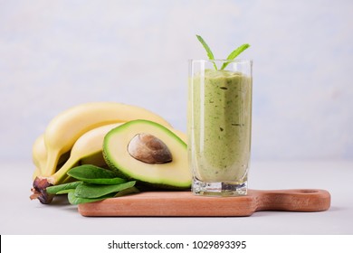 Healthy and Fresh Green Smoothie or Juice with Spinach, Avocado, Bananas and mint                              - Powered by Shutterstock