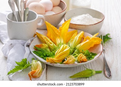 Healthy fried zucchini flower made of pancake batter. Zucchini flowers roasted in pancake batter.