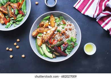 Healthy Grain Salad Bowl With Vegetables Chickpea Baked Potatoes Avocado And Fresh Herbs