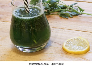 Healthy Green Juice With Parsley On Wooden Background