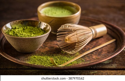 Healthy green matcha tea in bowl 
