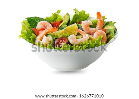Healthy green salad with grilled shrimps and vegetables isolated on white background. Grilled prawns. Healthy food. Seafood.
