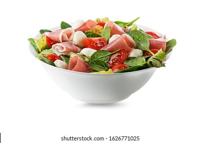 Healthy green salad with prosciutto, mozzarella and vegetables isolated on white background
