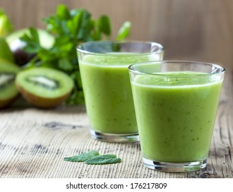 Healthy green Smoothie on wooden table - Powered by Shutterstock