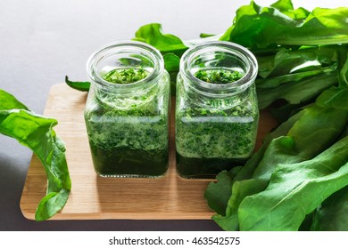 Healthy Green Sorrel And Spinach Smoothie In Glass Jar With Dark Background. Close Up. Concept Of Healthy Food. Natural Detox