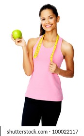Healthy happy hispanic woman with apple and tape measure for diet and weight loss concept