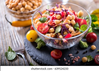 Healthy homemade chickpea and veggies salad, diet, vegetarian, vegan food, vitamin snack - Shutterstock ID 639524233