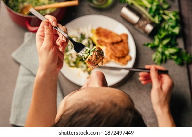 Healthy Homemade Dinner For The Low Carb Keto Diet.Creamy Sauteed Spinach With Parmesan And Cream With Low Carb Flour Alternative Breading Coated Chicken Breast Filets.Cooking And Eating Diet Foods