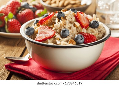 Healthy Homemade Oatmeal with Berries for Breakfast - Shutterstock ID 173846519