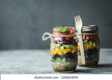 Healthy homemade salad in mason jar with quinoa and vegetables. Healthy food, clean eating, diet and detox. Copy space - Powered by Shutterstock