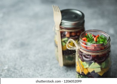 Healthy homemade salad in mason jar with quinoa and vegetables. Healthy food, clean eating, diet and detox. Copy space - Powered by Shutterstock