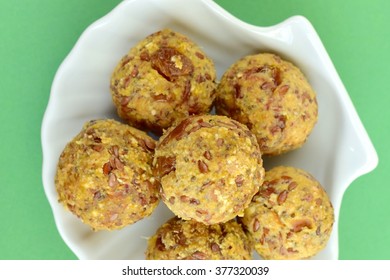 Healthy Honey Peanut Butter Date Walnut Protein Balls On Green Background