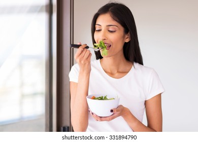 Healthy Indian Woman Eating Green Salad