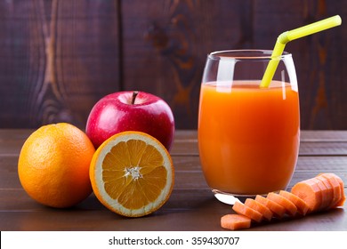 Healthy juice from apple, orange and carrot