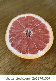 Healthy juicy Ruby Red grapefruit half for breakfast.