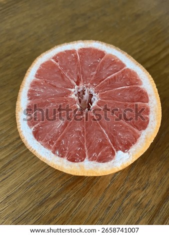 Healthy juicy Ruby Red grapefruit half for breakfast.