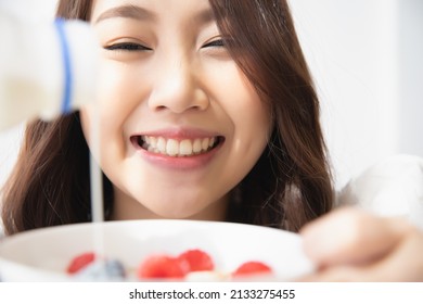 Healthy lifestyle, Close up beautiful young asian woman with fruit milk smiling happy. Healthy eating, Food and lifestyle, Health, Beauty, Dieting concept.