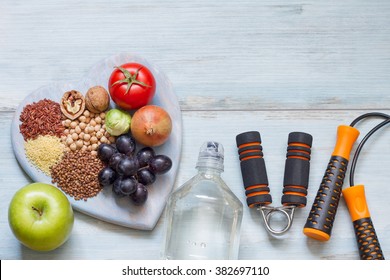 Healthy lifestyle concept with diet and fitness - Shutterstock ID 382697110