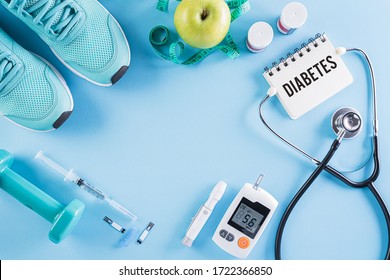 Healthy Lifestyle, Food And Sport Concept. Top View Of Diabetes Tester Set With Athlete's Equipment; Measuring Tape, Green Dumbbell And  Fruit On Bright Blue Pastel Background.