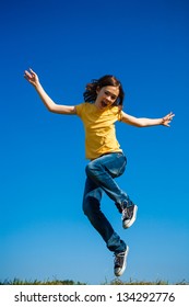 Healthy lifestyle - girl jumping, running outdoor