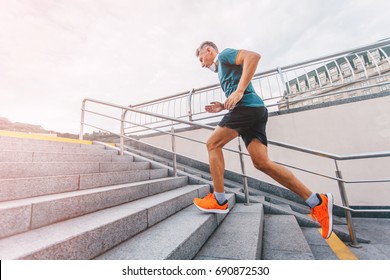 healthy lifestyle middle aged man runner running upstairs on cit - Shutterstock ID 690872530