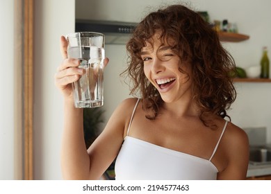 Healthy Lifestyle. Portrait Of Happy Smiling Young Woman With Glass Of Fresh Water. Healthcare. Drinks. Health, Beauty, Diet Concept. Healthy Eating.  - Powered by Shutterstock